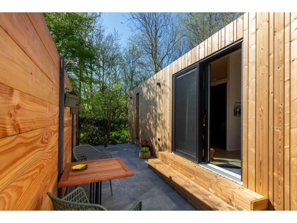 Enjoy a holiday in the cozy Tiny house on the edge of the forest and the dunes! photo 2