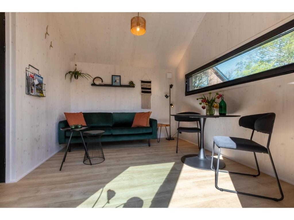 Enjoy a holiday in the cozy Tiny house on the edge of the forest and the dunes! photo 3