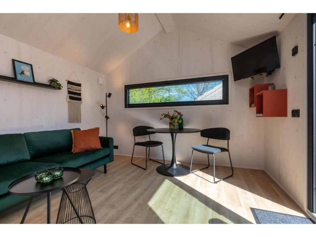Enjoy a holiday in the cozy Tiny house on the edge of the forest and the dunes! photo 4