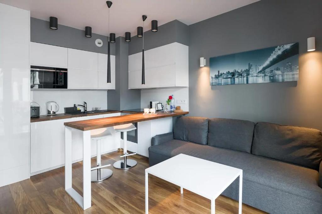 Modern and comfortable with a bedroom - Tap to explore photos