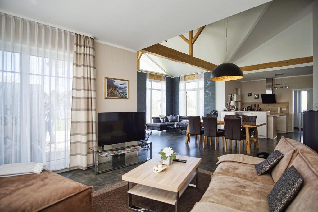 modernes Haus mit Kamin und eigener Sauna sowie Garten - Ferienhaus Windrose photo 1
