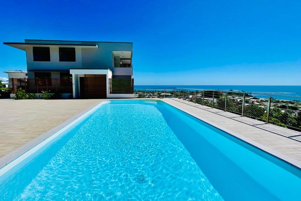 Heaniki'z apartment ocean view pool near Papeete - 2 bdr - AC - Wifi