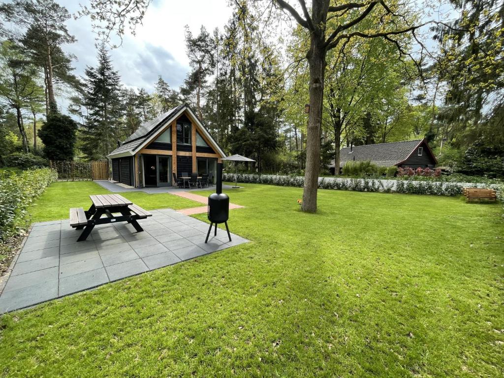 Cosy energy friendly holiday home in a wooded area in Lochem photo 1