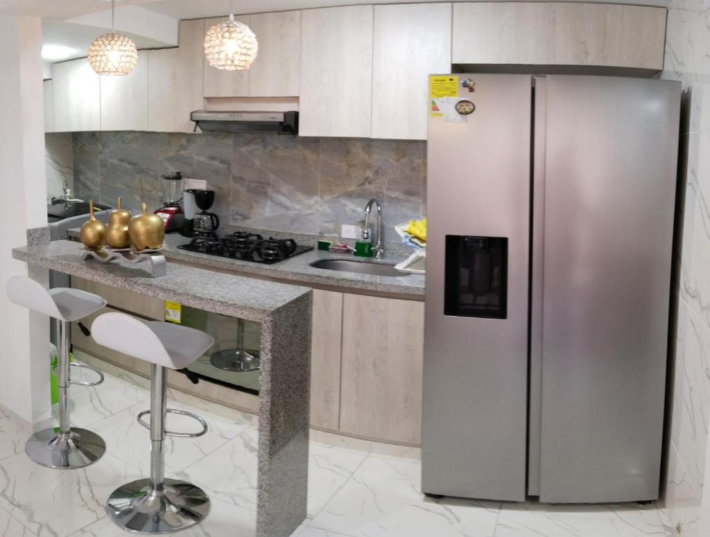 SU APARTAMENTO NEIVA CON AIRE Acondicionado photo 3