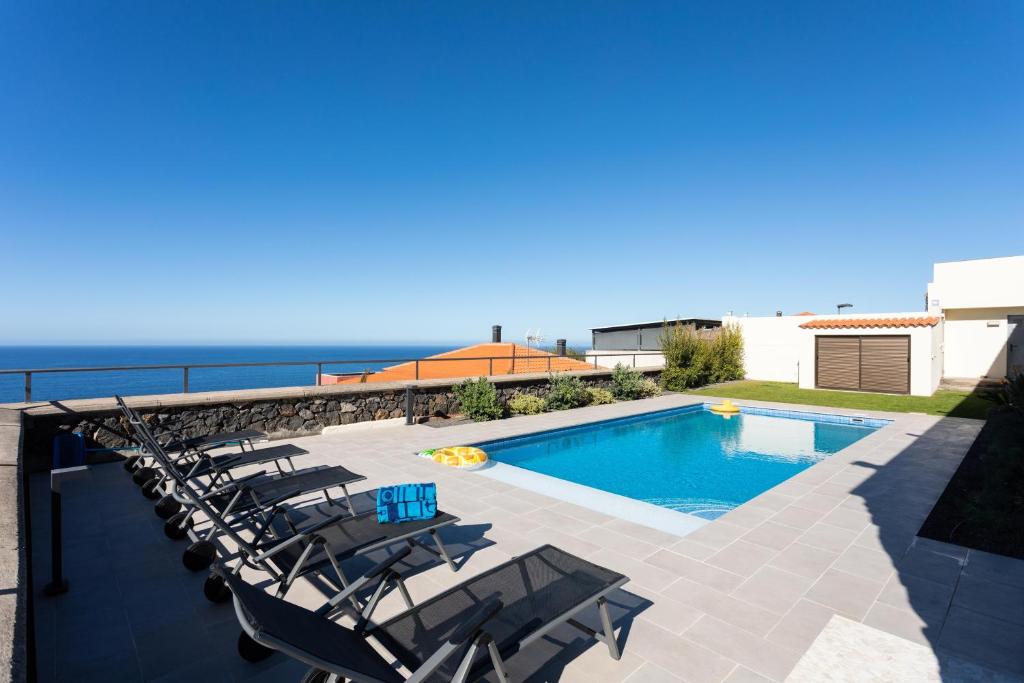 Prime Sea and Mountain views Home with pool photo 1