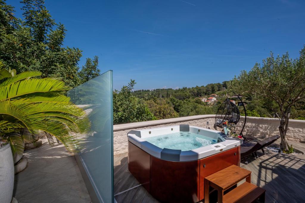 Uniquely designed Villa Ivana with outdoor Jacuzzi nearby the pebble Banje beach at the Island of Solta photo 2