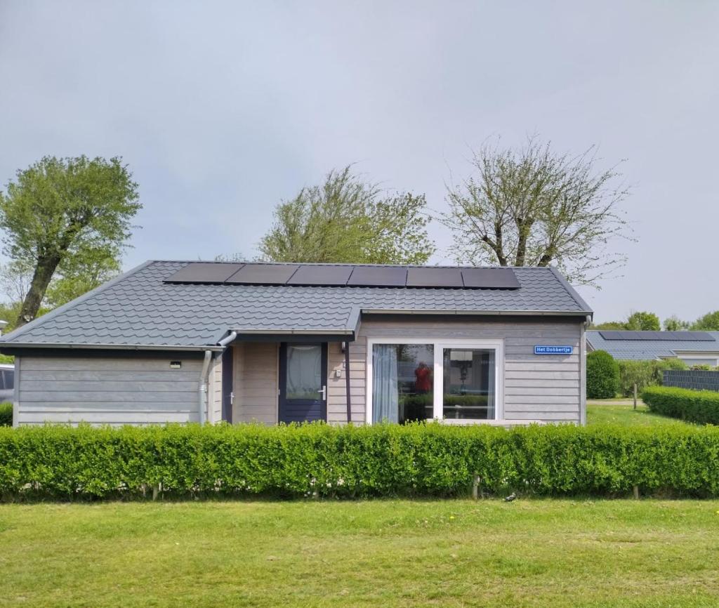 Het Dobbertje, charmant houten huisje photo 1