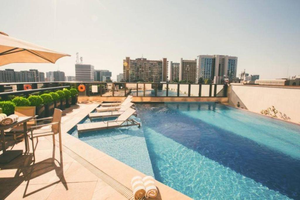 CULLINAN HOTEL FLAT DE LUXO apartamento 1409 - Tap to explore photos