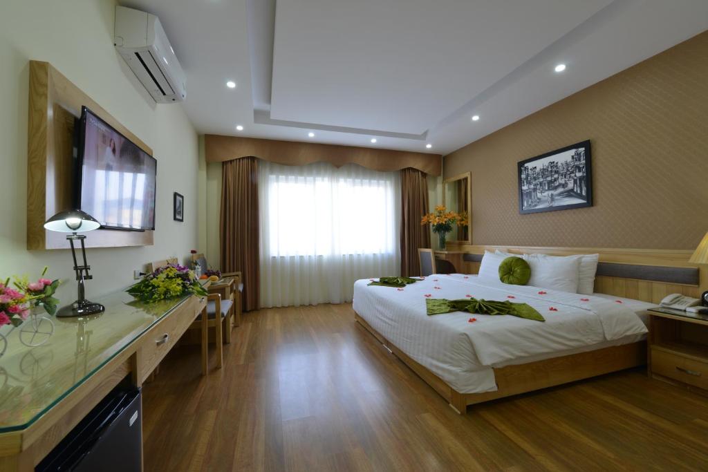 Blue Hanoi Inn Hotel - Tap to explore photos
