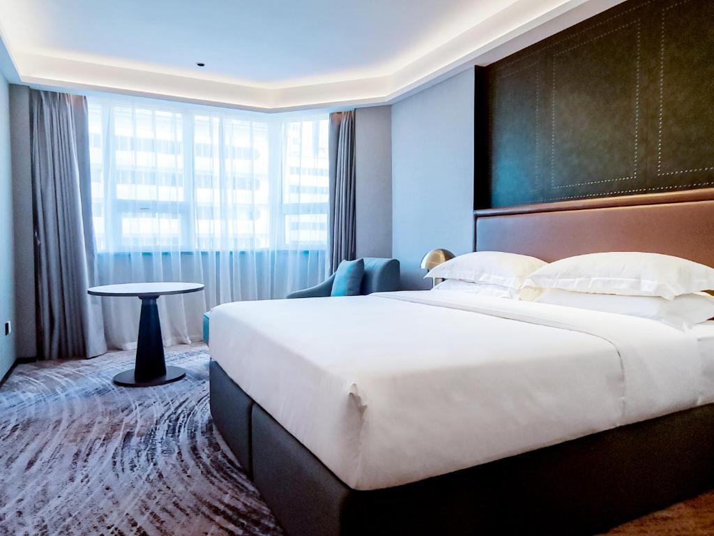Shenzhen Shanghai Hotel -Complimentary Mini Bar and Late Check Out photo 1