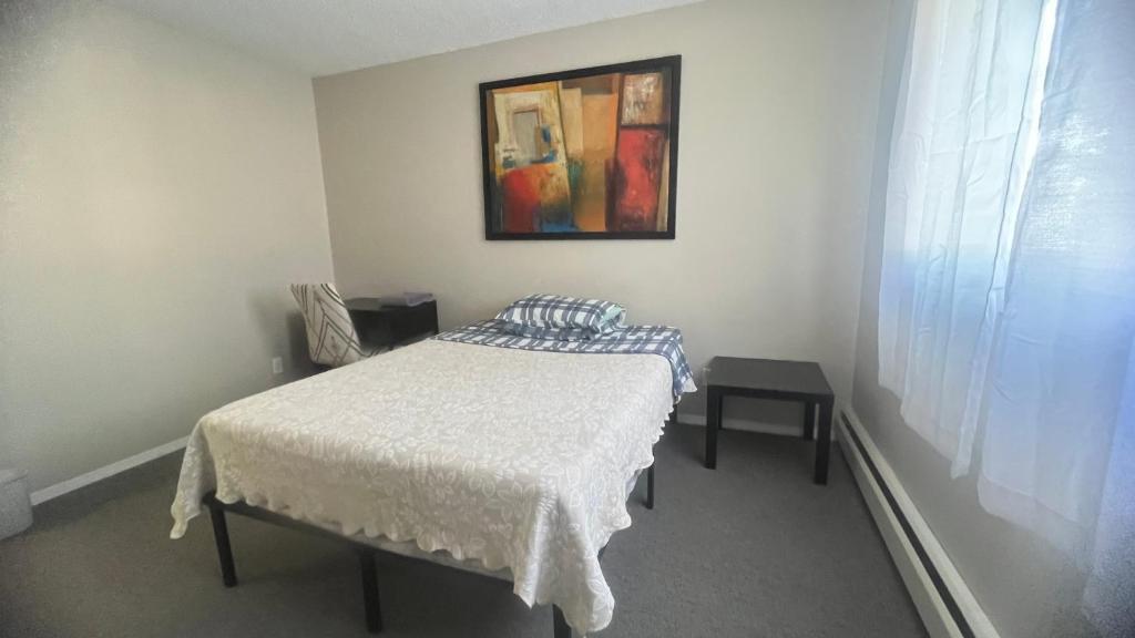 Private Room in Oliver 104 ave, Across Grand McEwan University, Norquest College, A Chic Location! photo 1