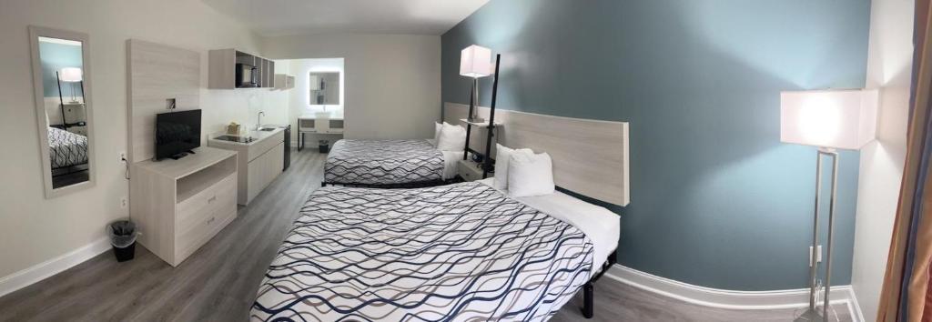 Magnolia Inn Extended Stay of Kingsland - New 2024 - Book a Kitchen Room - 12 Noon Check Out - Sleep In Late - Better Sleep - Ultra Sparkling - Pool open until until 4AM - Stay and Save Today - 24 Hour Front Desk - Premium Coffee Bar - Award Winning Inn image