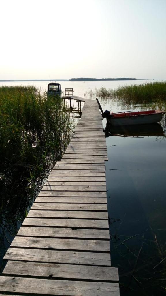 Domek nad brzegiem jeziora Śniardwy z własnym pomostem, zejściem do wody i przecudnym widokiem na jezioro photo 1