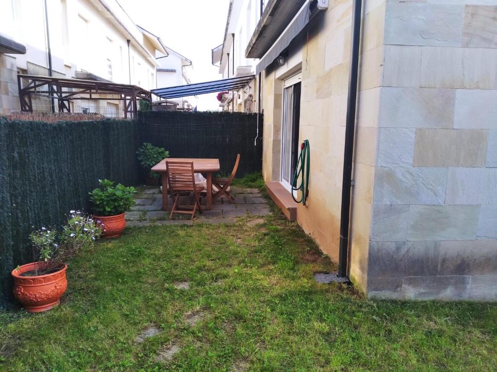 Chalet con piscina entre Liencres y Suances photo 3