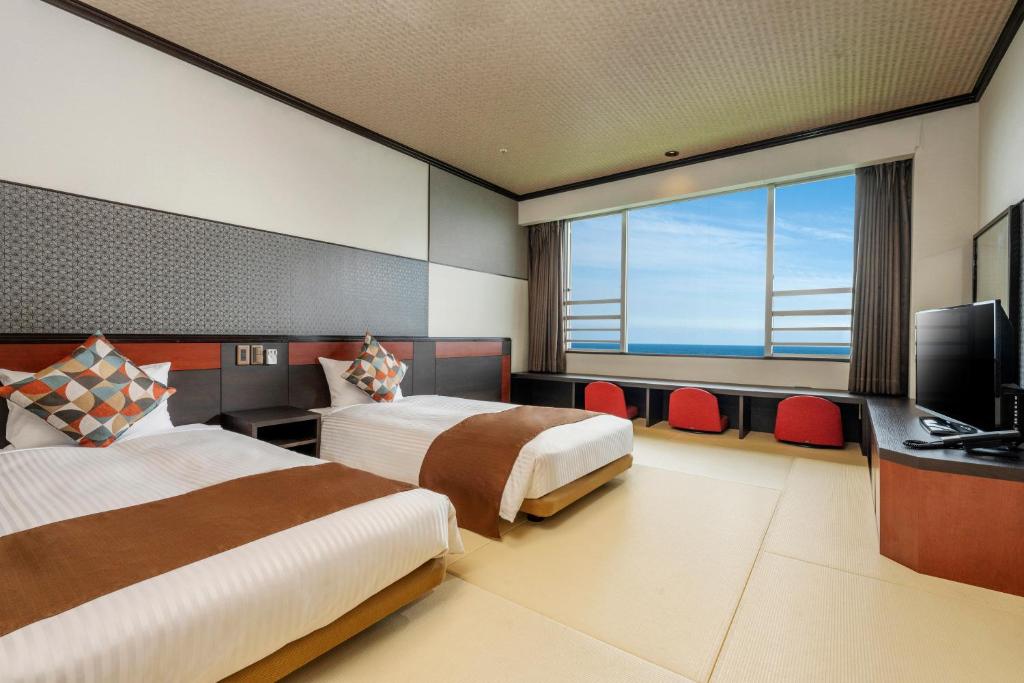Hotel New Akao - Tap to explore photos