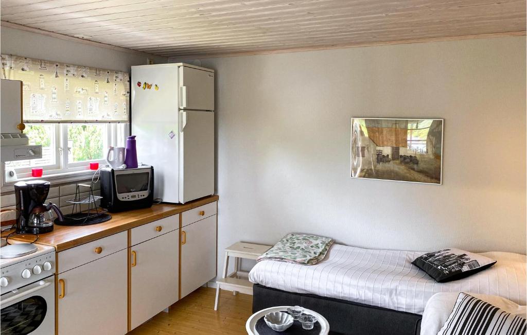Amazing Home In Boxholm With Internet photo 1