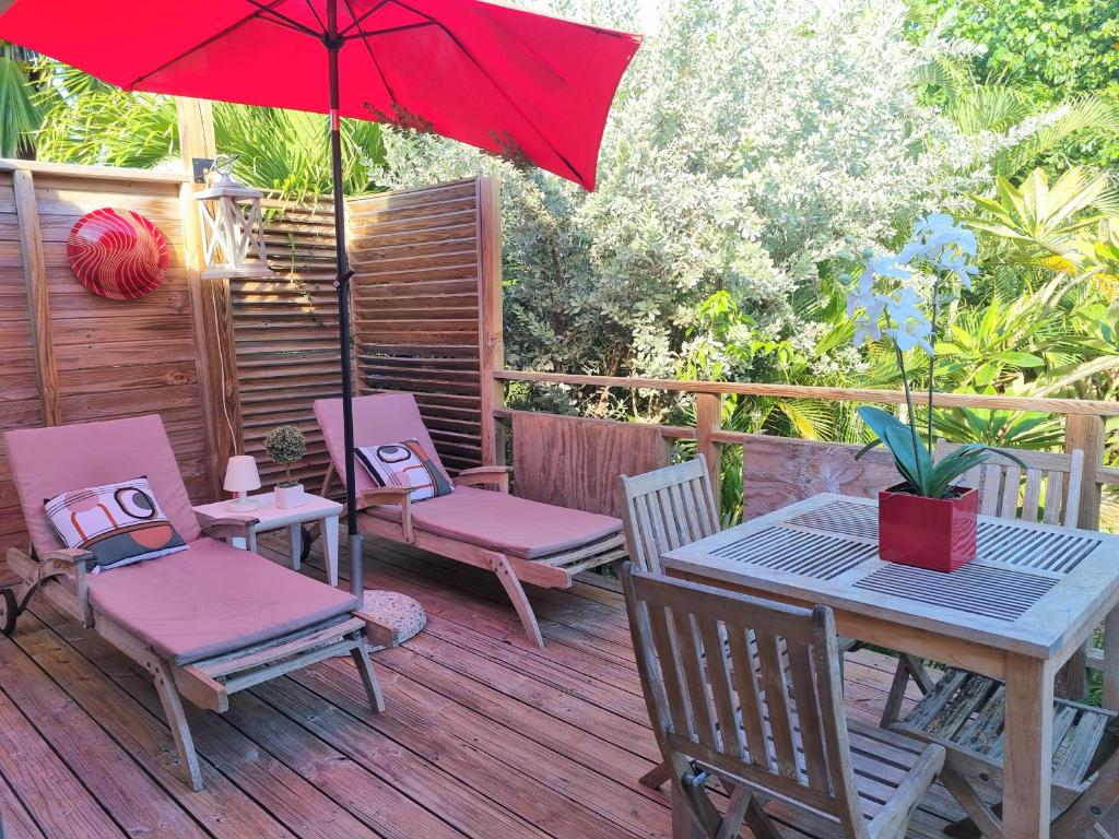 Appartement au coeur d'Orient Bay avec terrasse jardin Jacuzzi et citerne
