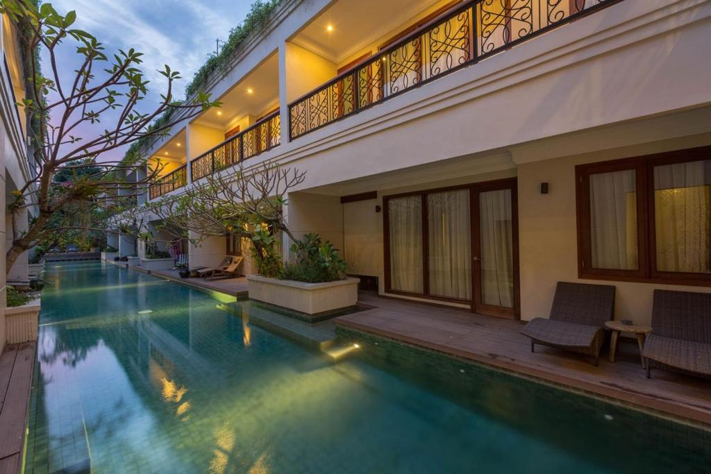 Seminyak Lagoon All Suites Hotel - Tap to explore photos