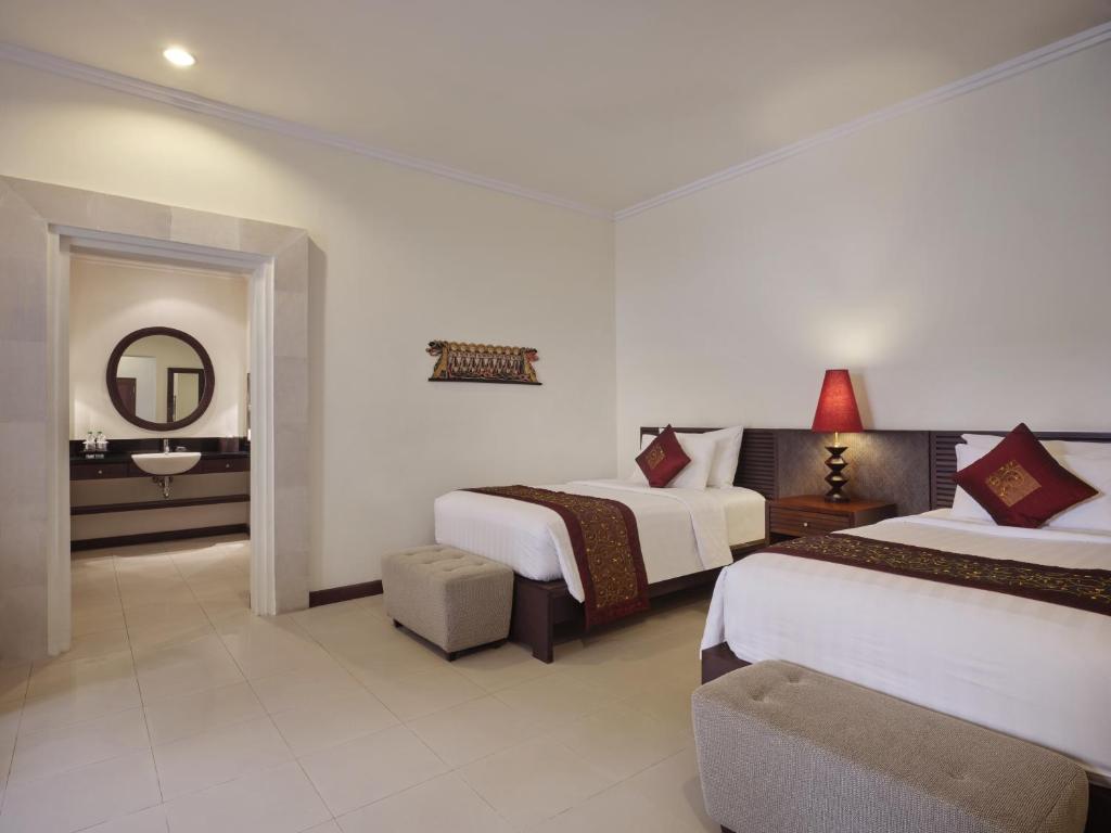 Griya Santrian Beach Resort - Tap to explore photos