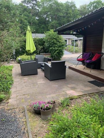 Sfeervolle blokhut op de Veluwe op recreatiepark Topparken in Beekbergen met vrije tuin en eigen parkeerplaats photo 1