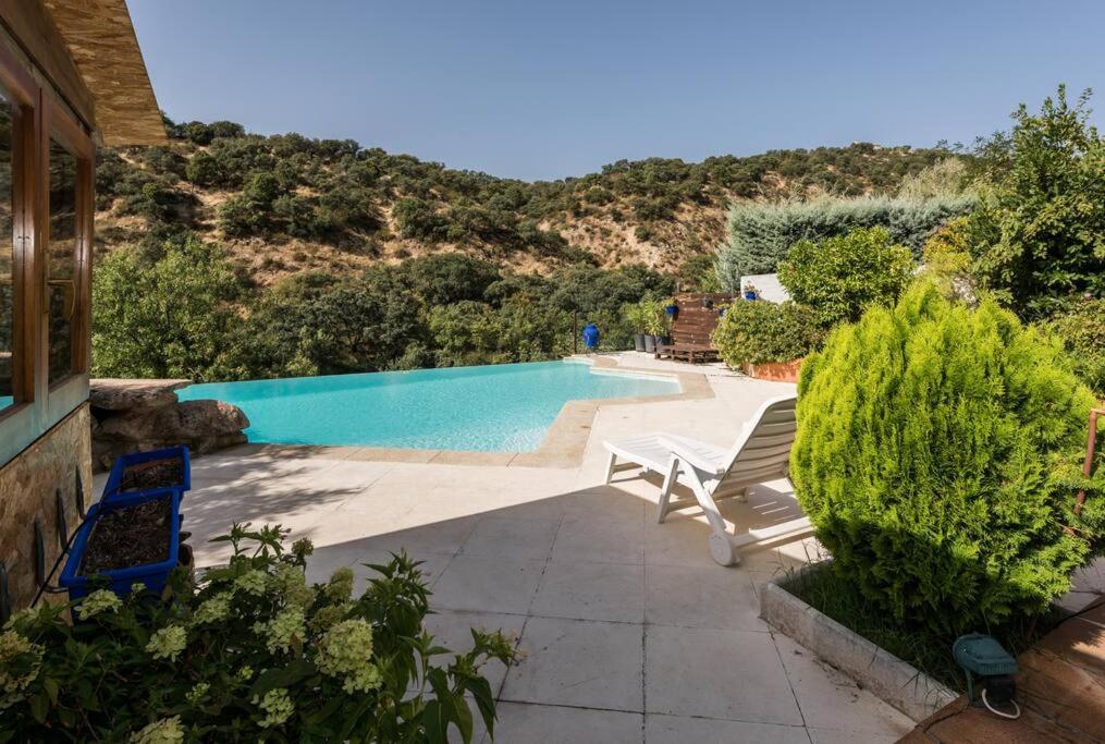 Casa con vistas increíbles, piscina Infinity y jardín con rincones preciosos photo 4