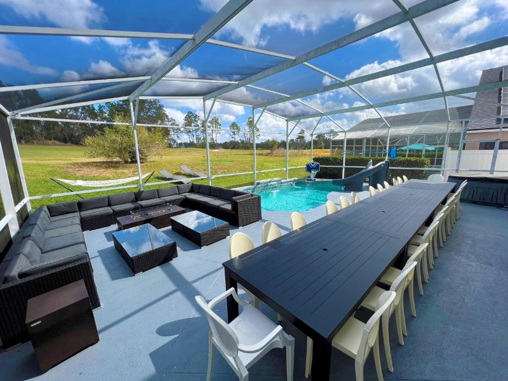 14 Room DisneyEstate by AmericanVacationliving photo 2