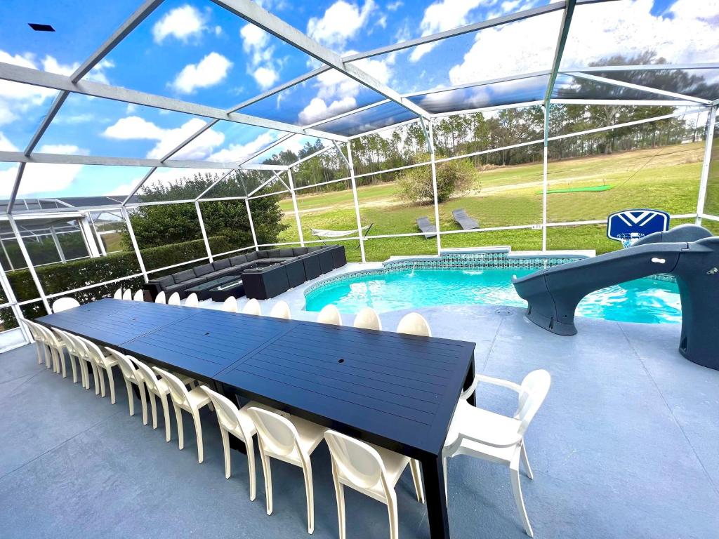 14 Room DisneyEstate by AmericanVacationliving photo 4