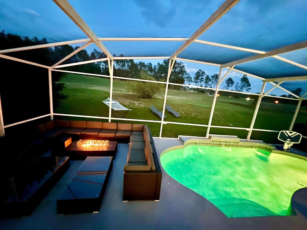 14 Room DisneyEstate by AmericanVacationliving photo 3
