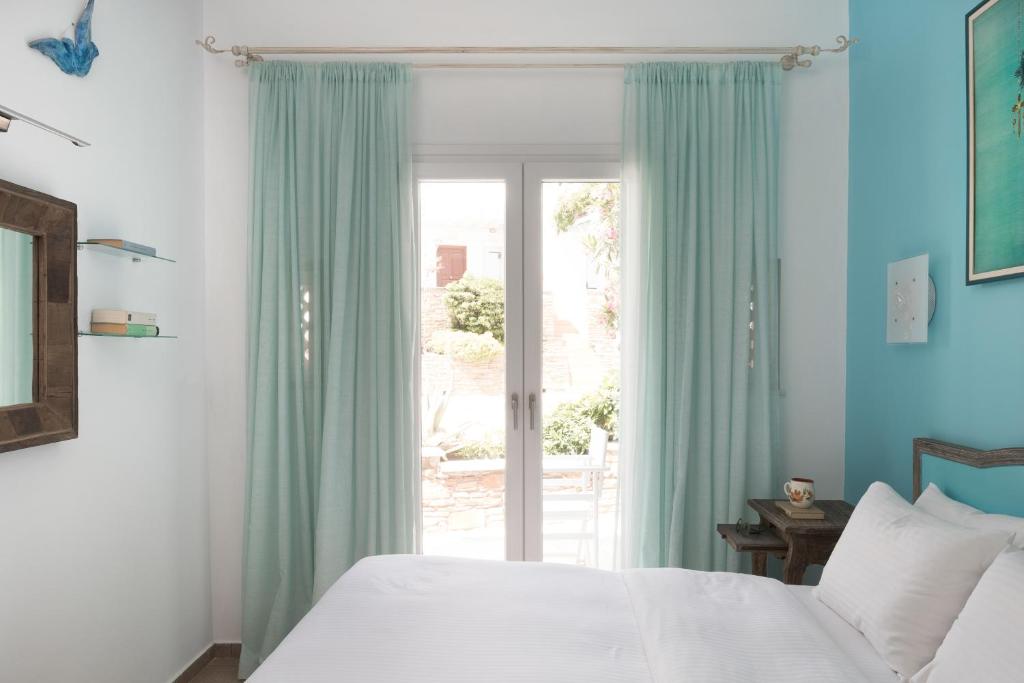 Tinos Resort Hotel - Tap to explore photos