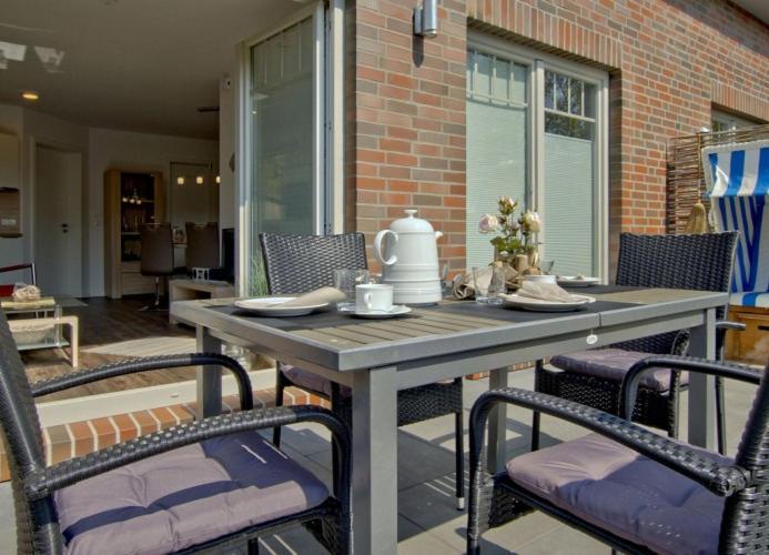 Inselparadies - Neubauwohnung mit großer Terrasse, Strandkorb und Garten. photo 2