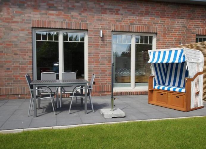 Inselparadies - Neubauwohnung mit großer Terrasse, Strandkorb und Garten. photo 3