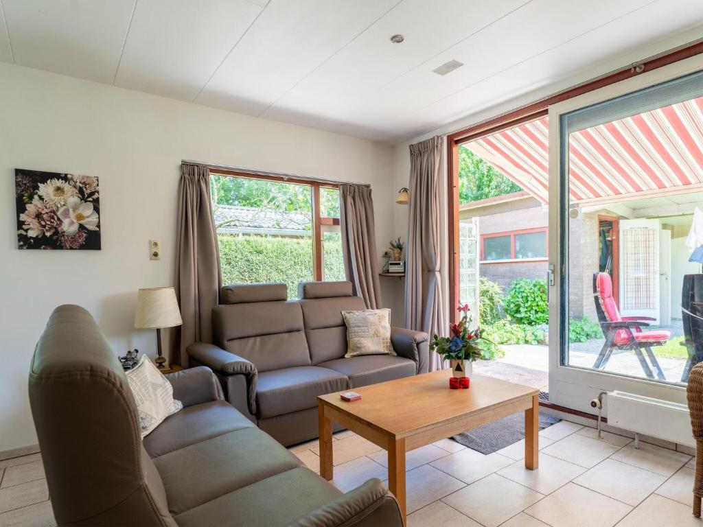 Modern holiday home in Baarland with swimming pool photo 1
