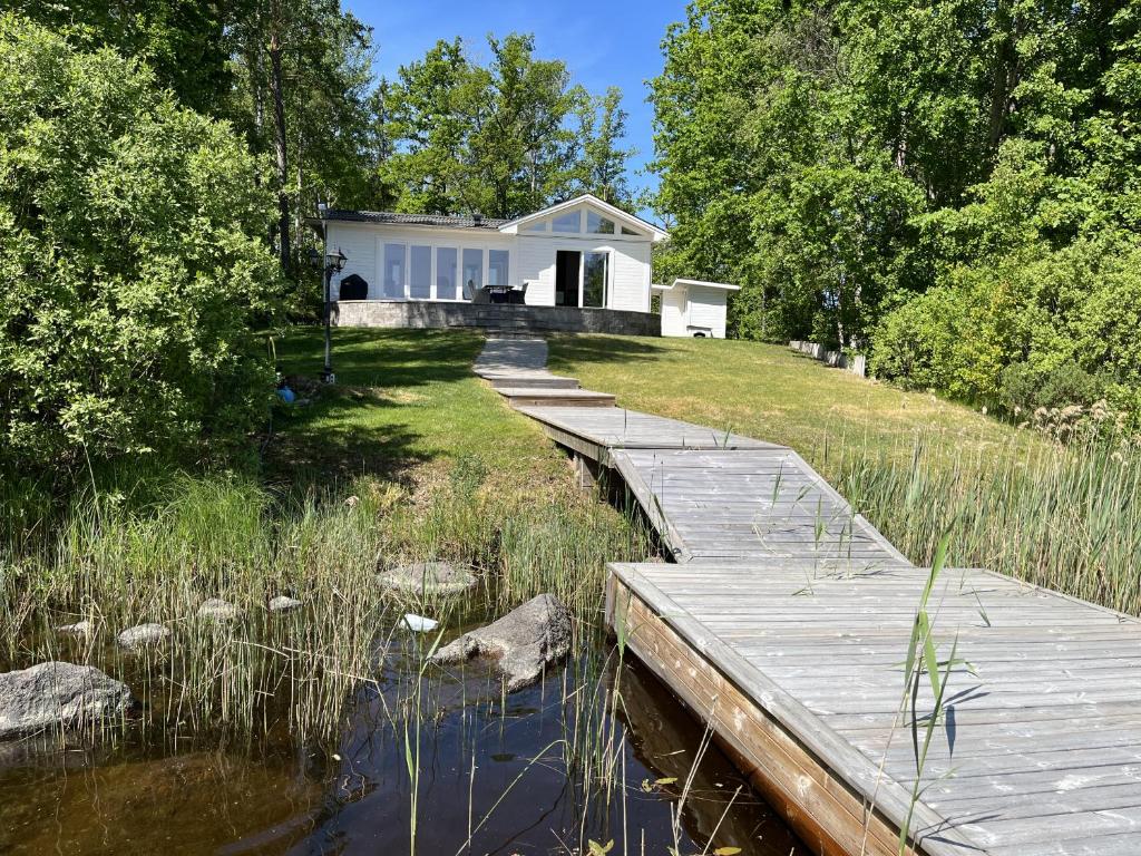 Newly built cottage located on a lake plot by Lake Flaten