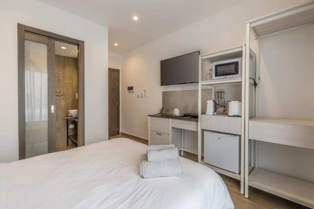 Studio 23 with kitchenette at the new Olo living photo 2