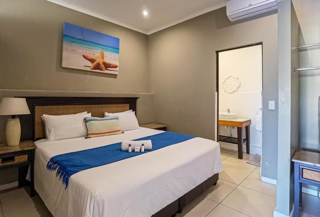 Ballito Bay holiday Apartment Room Type - One-Bedroom Apartment (Unit 1) with partial Sea View Ballito Bay holiday Apartment Room Type - One-Bedroom Apartment (Unit 1) with partial Sea View