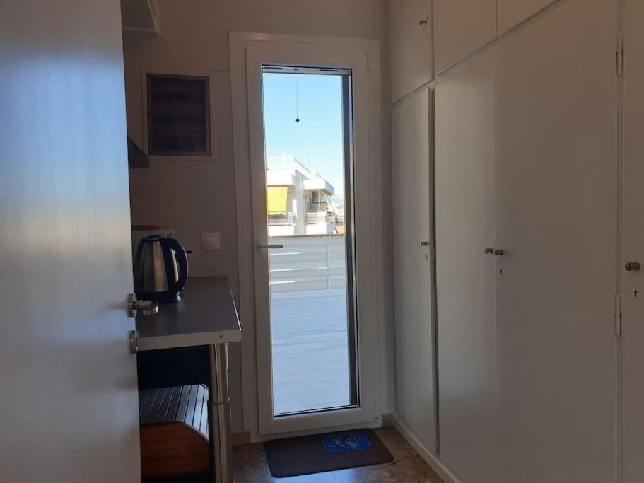 Rooftop Studio Apt - 5 Min Walk to Holargos Metro - Tap to explore photos