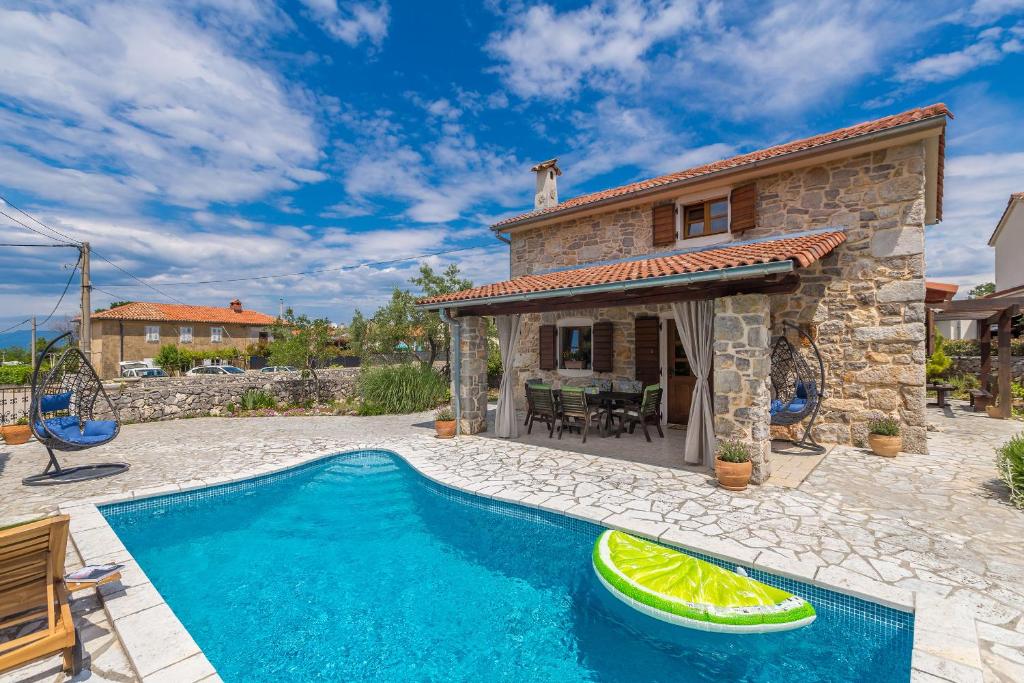 Holiday house ANDREA with pool photo 1