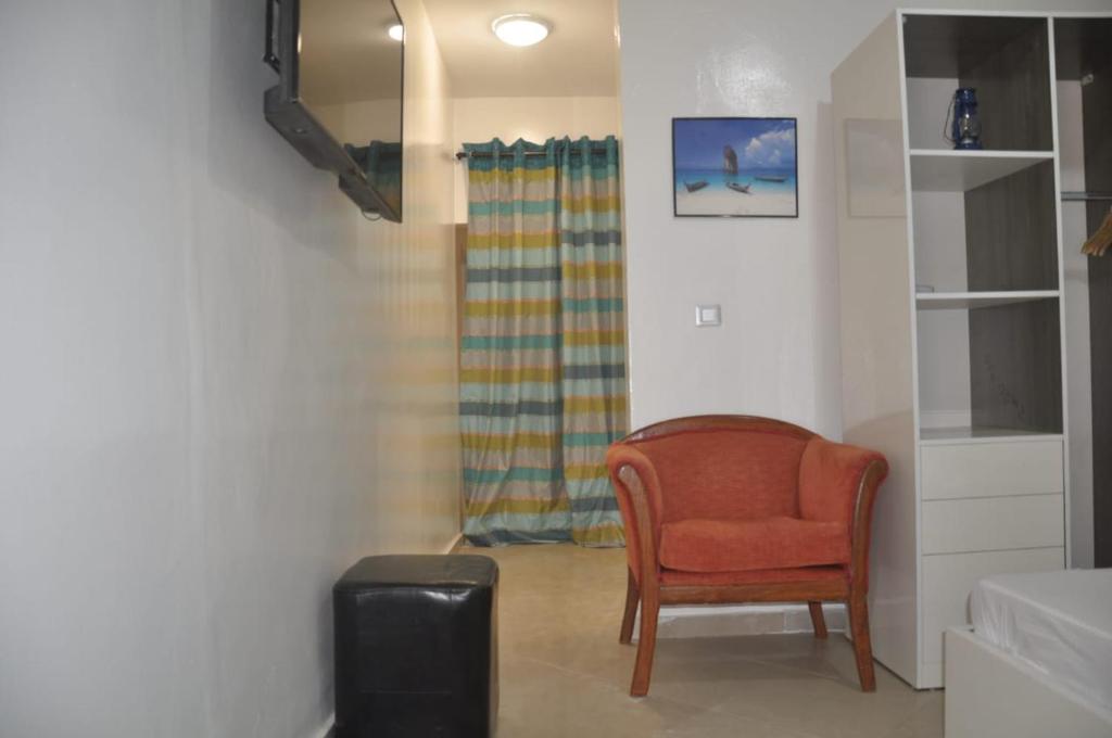 " Le Nid Douillet ", un fabuleux studio, calme, cosy et bien climatisé au centre de saly photo 2