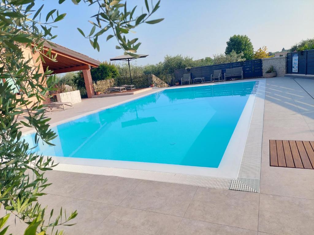 CASA PERGOLA 1 - Elegante Appartamento per 6 persone - fronte piscina, parcheggio photo 1