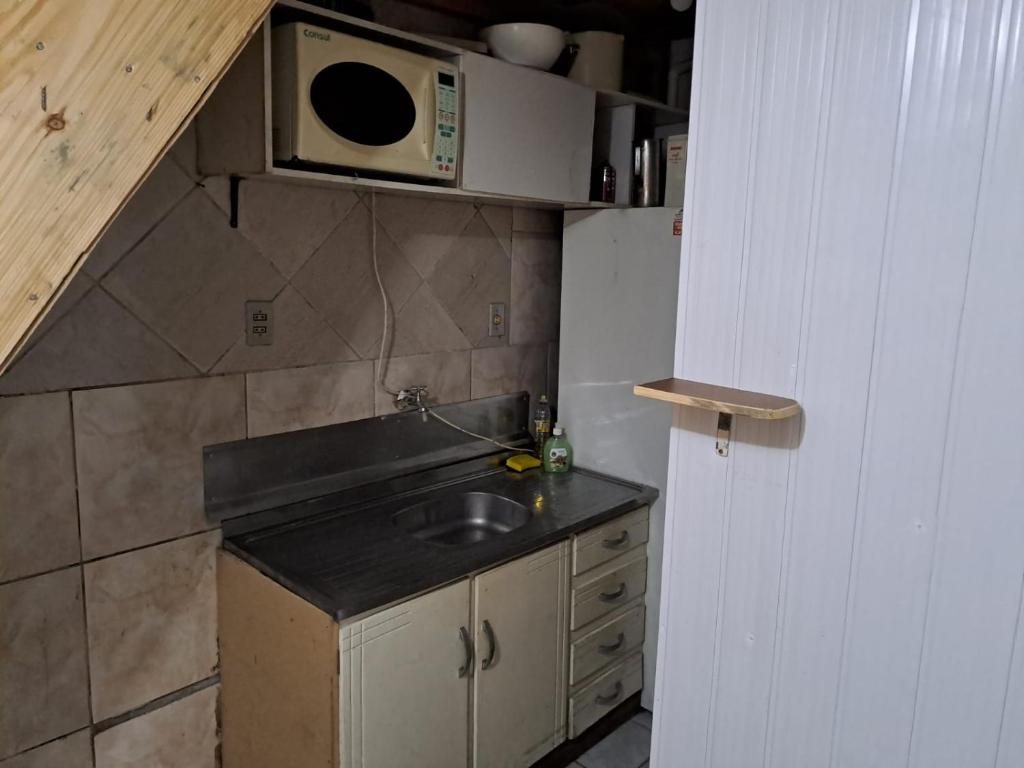Quarto privativo, banheiro externo. photo 3