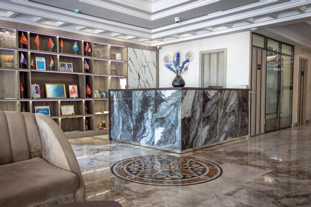 Orient Hotel Bishkek - Tap to explore photos