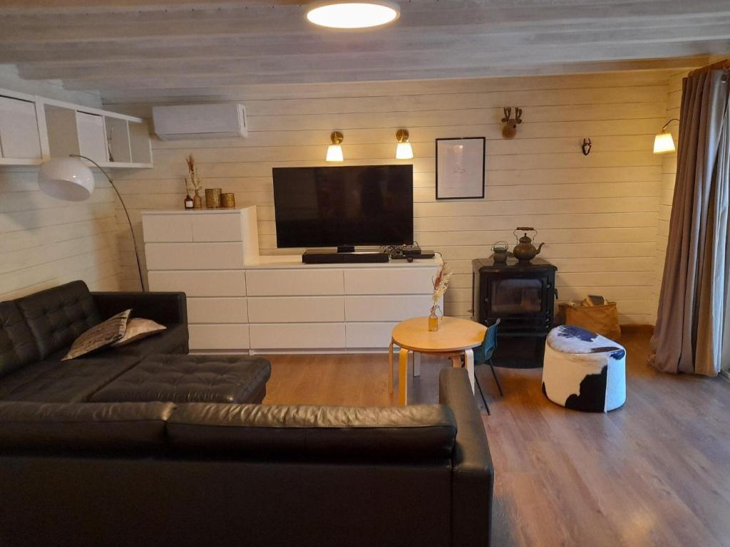 Cozy chalet in a nature reserve with garden photo 1