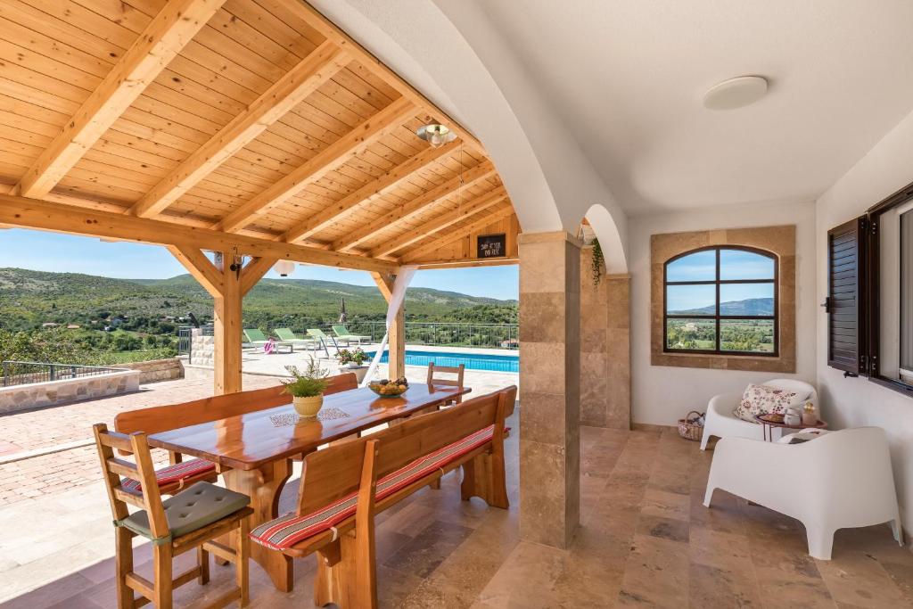 Luxury villa with heated pool & magnificent view photo 2