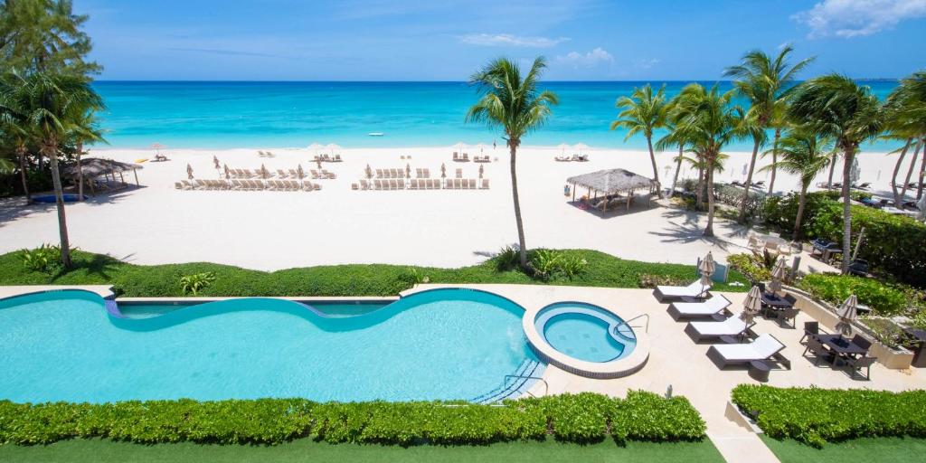 The Beachcomber - Oceanfront Penthouses by Grand Cayman Villas & Condos photo 2