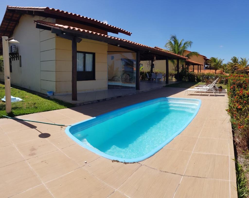 Casa espetacular em condomínio pé-na-areia, PZ11 photo 1