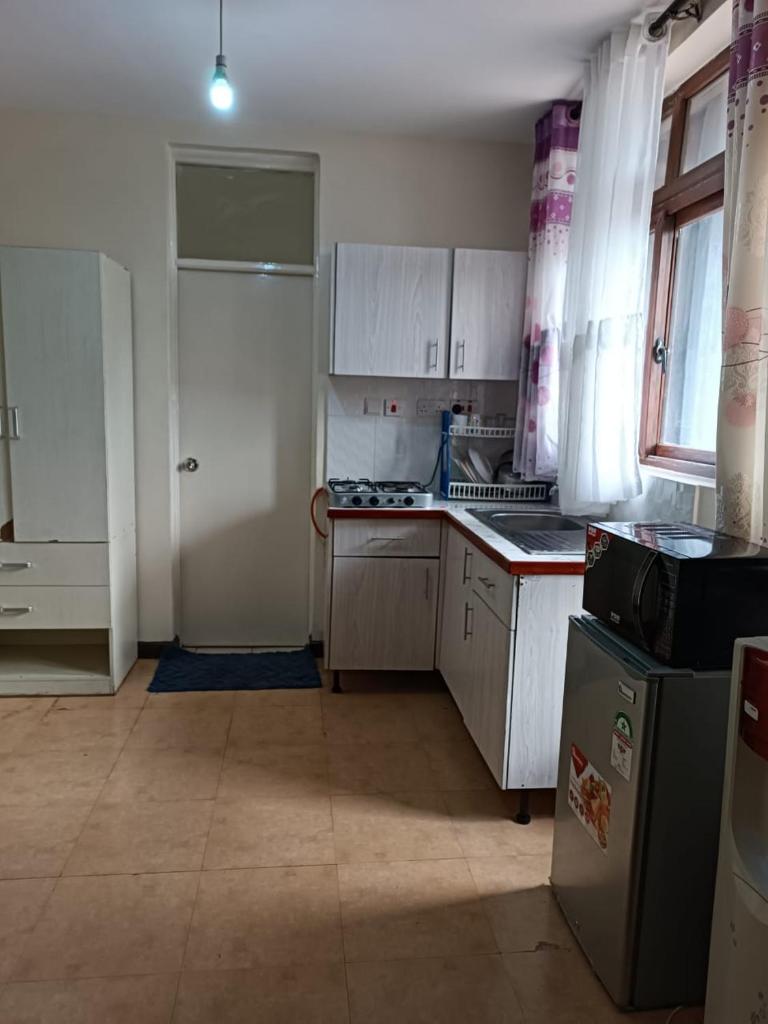 Lux Suites kipande Road Studio Apartment - Tap to explore photos