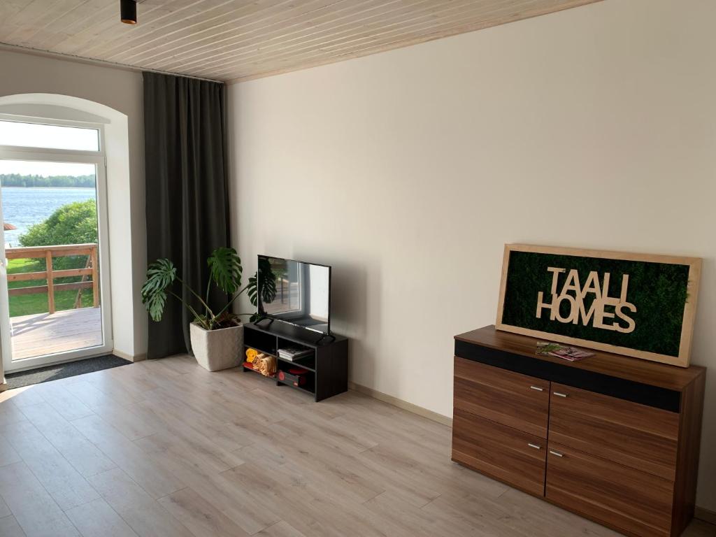 TaaliHomes Kuremaa ridaelamu järve kaldal - saun hinnas photo 3