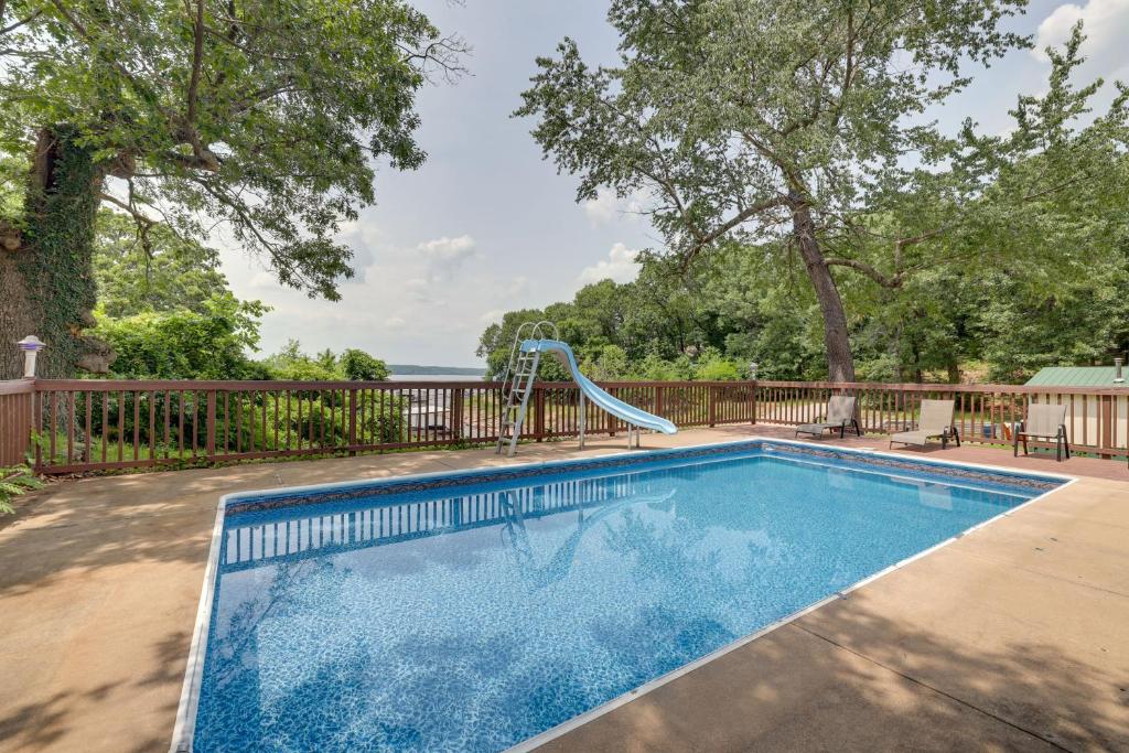 Lakefront Grove Home with Dock, Hot Tub, and Fishing! photo 1