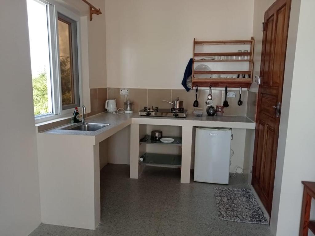 Kome beach Apartment one photo 1
