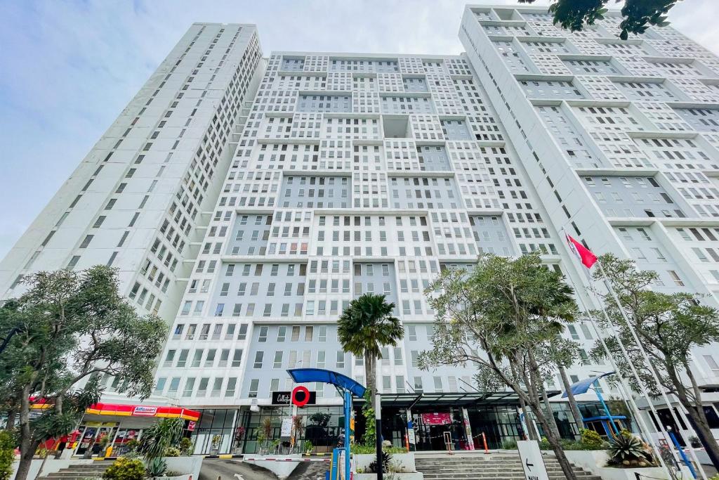RedLiving Apartemen Patra Land Urbano - Happy Rooms Tower Mid-West with Netflix
